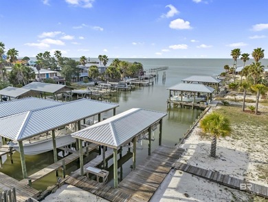 Beautiful, classic beach cottage on Mobile Bay with an on Kiva Dunes Golf Club in Alabama - for sale on GolfHomes.com, golf home, golf lot