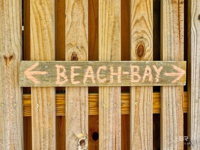 Beautiful, classic beach cottage on Mobile Bay with an on Kiva Dunes Golf Club in Alabama - for sale on GolfHomes.com, golf home, golf lot