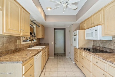 3 bed, 2 bath golf-course living with serious upside. Set right on Union Hills Country Club in Arizona - for sale on GolfHomes.com, golf home, golf lot