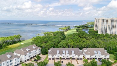 Welcome to refined coastal living in this exquisite end-unit on Kelly Plantation Golf Club in Florida - for sale on GolfHomes.com, golf home, golf lot