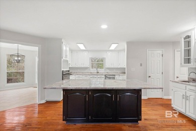 Welcome to this beautifully updated 4/2 home in the highly on Lake Forest Yacht and Country Club in Alabama - for sale on GolfHomes.com, golf home, golf lot