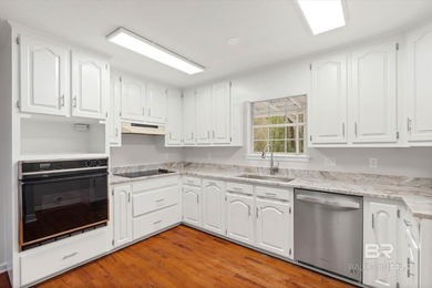 Welcome to this beautifully updated 4/2 home in the highly on Lake Forest Yacht and Country Club in Alabama - for sale on GolfHomes.com, golf home, golf lot