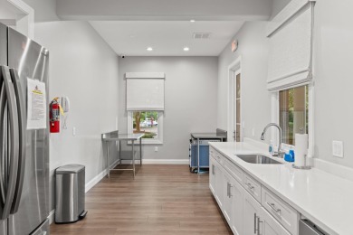 Welcome to refined coastal living in this exquisite end-unit on Kelly Plantation Golf Club in Florida - for sale on GolfHomes.com, golf home, golf lot