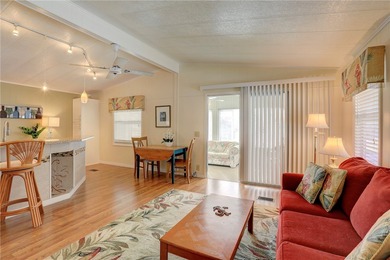 Fully furnished home located across from the golf course on Barefoot Bay Golf Course in Florida - for sale on GolfHomes.com, golf home, golf lot