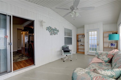 Fully furnished home located across from the golf course on Barefoot Bay Golf Course in Florida - for sale on GolfHomes.com, golf home, golf lot