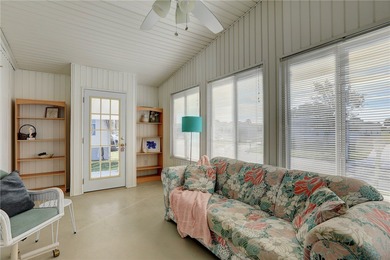 Fully furnished home located across from the golf course on Barefoot Bay Golf Course in Florida - for sale on GolfHomes.com, golf home, golf lot