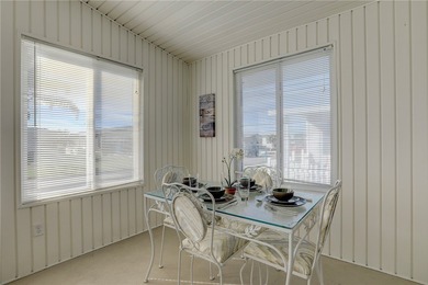 Fully furnished home located across from the golf course on Barefoot Bay Golf Course in Florida - for sale on GolfHomes.com, golf home, golf lot