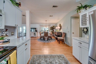 If a beautiful furnished home with many updates is what your on Pine Lakes Country Club in Florida - for sale on GolfHomes.com, golf home, golf lot