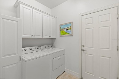 Loaded with upgrades, PRICED TO SELL, and privately positioned on Sarasota National Golf Club in Florida - for sale on GolfHomes.com, golf home, golf lot