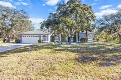 BEAUTIFULLY APPOINTED & WELL MAINTAINED 3/2/2 POOL HOME WITH DEN on Pine Ridge Community Golf and Country Club in Florida - for sale on GolfHomes.com, golf home, golf lot