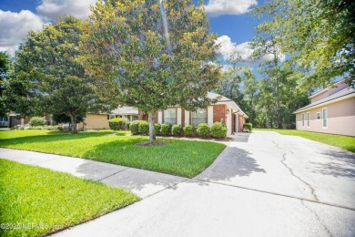 Welcome to this beautifully maintained Brick 4-bedroom on Golf Club At Fleming Island in Florida - for sale on GolfHomes.com, golf home, golf lot