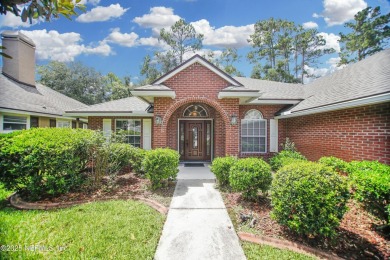 Welcome to this beautifully maintained Brick 4-bedroom on Golf Club At Fleming Island in Florida - for sale on GolfHomes.com, golf home, golf lot