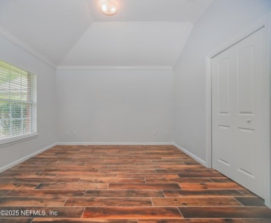 Welcome to this beautifully maintained Brick 4-bedroom on Golf Club At Fleming Island in Florida - for sale on GolfHomes.com, golf home, golf lot