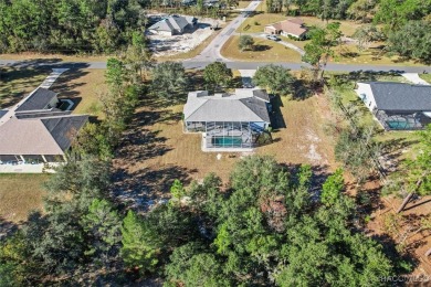 BEAUTIFULLY APPOINTED & WELL MAINTAINED 3/2/2 POOL HOME WITH DEN on Pine Ridge Community Golf and Country Club in Florida - for sale on GolfHomes.com, golf home, golf lot