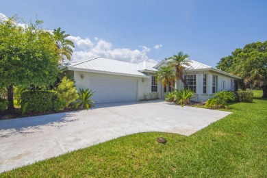 Invest in Location with this Lakefront property overlooking the on Meadowood Golf and Tennis Club in Florida - for sale on GolfHomes.com, golf home, golf lot