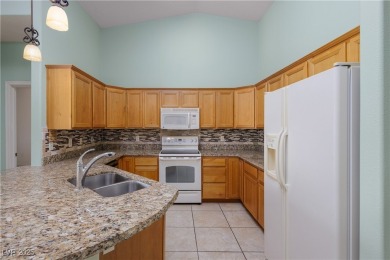 This 4-bed, 2 bath townhome sits right on the golf course with on Coyote Willows Golf Club in Nevada - for sale on GolfHomes.com, golf home, golf lot