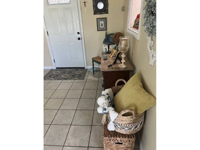 Stunningly updated and positioned in a gated, highly active 55+ on Hamptons Golf Club in Florida - for sale on GolfHomes.com, golf home, golf lot