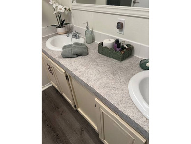 Stunningly updated and positioned in a gated, highly active 55+ on Hamptons Golf Club in Florida - for sale on GolfHomes.com, golf home, golf lot