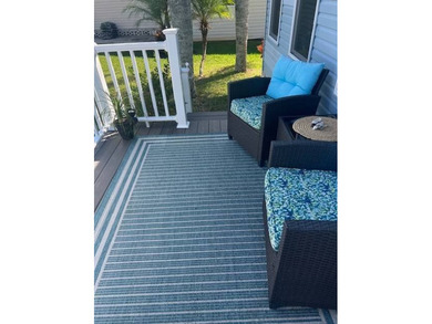 Stunningly updated and positioned in a gated, highly active 55+ on Hamptons Golf Club in Florida - for sale on GolfHomes.com, golf home, golf lot