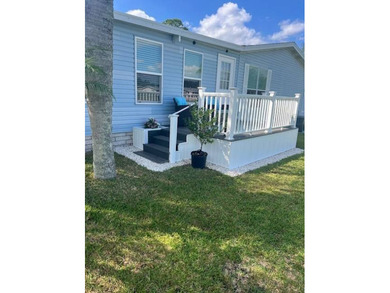 Stunningly updated and positioned in a gated, highly active 55+ on Hamptons Golf Club in Florida - for sale on GolfHomes.com, golf home, golf lot