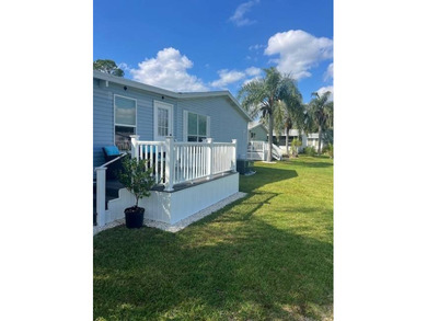 Stunningly updated and positioned in a gated, highly active 55+ on Hamptons Golf Club in Florida - for sale on GolfHomes.com, golf home, golf lot