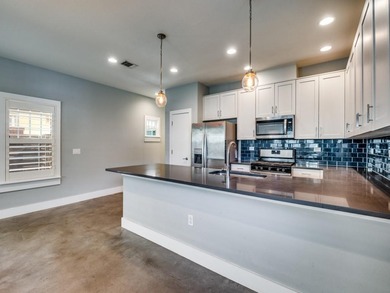 Experience effortless living in this turnkey, energy-efficient on Stevens Park Golf Course in Texas - for sale on GolfHomes.com, golf home, golf lot