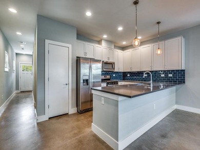 Experience effortless living in this turnkey, energy-efficient on Stevens Park Golf Course in Texas - for sale on GolfHomes.com, golf home, golf lot