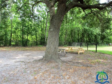 Stunningly updated and positioned in a gated, highly active 55+ on Hamptons Golf Club in Florida - for sale on GolfHomes.com, golf home, golf lot