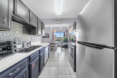 Beautifully updated 2-bedroom, 2-bath condo in the highly on Seascape Golf Course in Florida - for sale on GolfHomes.com, golf home, golf lot