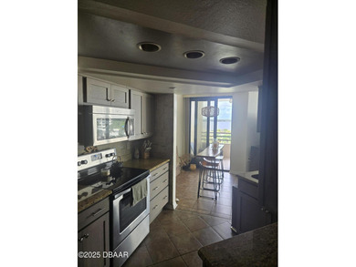 Escape to your own coastal sanctuary in this beautiful on Oceans Golf Club in Florida - for sale on GolfHomes.com, golf home, golf lot