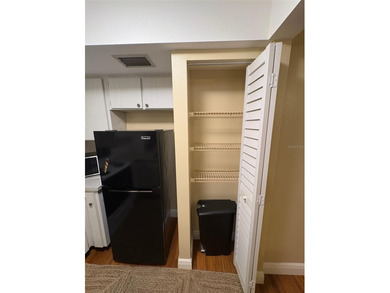 Step inside this condo and appreciate the bright, open floor on Tarpon Springs Golf Course in Florida - for sale on GolfHomes.com, golf home, golf lot