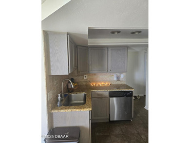 Escape to your own coastal sanctuary in this beautiful on Oceans Golf Club in Florida - for sale on GolfHomes.com, golf home, golf lot