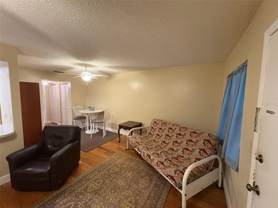 Step inside this condo and appreciate the bright, open floor on Tarpon Springs Golf Course in Florida - for sale on GolfHomes.com, golf home, golf lot