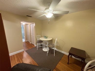 Step inside this condo and appreciate the bright, open floor on Tarpon Springs Golf Course in Florida - for sale on GolfHomes.com, golf home, golf lot