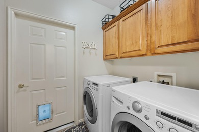 Nestled beside Hole 11 of Green Spring Golf Course, this on Green Spring Country Club in Utah - for sale on GolfHomes.com, golf home, golf lot