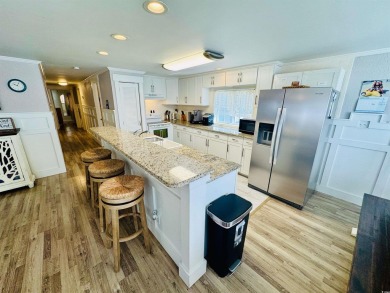 JUST LISTED... LARGE DOUBLE WIDE BEACH HOUSE ON EXTRA LARGE LOT on Prestwick Country Club in South Carolina - for sale on GolfHomes.com, golf home, golf lot