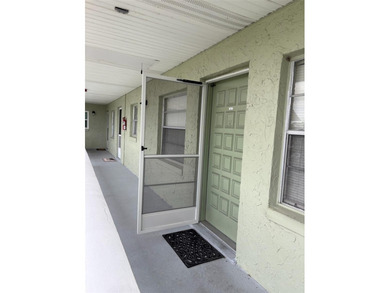 Step inside this condo and appreciate the bright, open floor on Tarpon Springs Golf Course in Florida - for sale on GolfHomes.com, golf home, golf lot