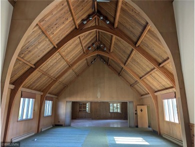 Formerly used as a church, this empty commercial zoned building on Long Prairie Country Club in Minnesota - for sale on GolfHomes.com, golf home, golf lot