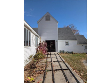 Formerly used as a church, this empty commercial zoned building on Long Prairie Country Club in Minnesota - for sale on GolfHomes.com, golf home, golf lot