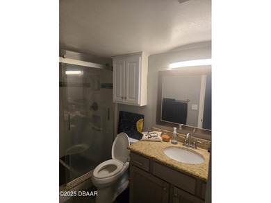 Escape to your own coastal sanctuary in this beautiful on Oceans Golf Club in Florida - for sale on GolfHomes.com, golf home, golf lot