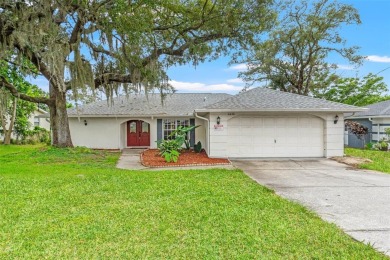 Welcome to this well maintained 2-bedroom, 2-bathroom on Oak Hills Country Club in Florida - for sale on GolfHomes.com, golf home, golf lot