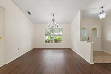 Welcome to this well maintained 2-bedroom, 2-bathroom on Oak Hills Country Club in Florida - for sale on GolfHomes.com, golf home, golf lot