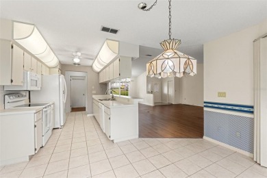 Welcome to this well maintained 2-bedroom, 2-bathroom on Oak Hills Country Club in Florida - for sale on GolfHomes.com, golf home, golf lot