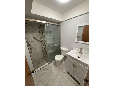 Step inside this condo and appreciate the bright, open floor on Tarpon Springs Golf Course in Florida - for sale on GolfHomes.com, golf home, golf lot