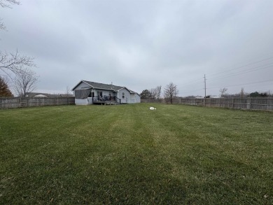 This delightful Ranch style home was built in 2003 and offers on Hesston Golf Park in Kansas - for sale on GolfHomes.com, golf home, golf lot