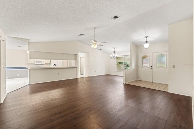 Welcome to this well maintained 2-bedroom, 2-bathroom on Oak Hills Country Club in Florida - for sale on GolfHomes.com, golf home, golf lot