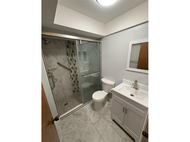 Step inside this condo and appreciate the bright, open floor on Tarpon Springs Golf Course in Florida - for sale on GolfHomes.com, golf home, golf lot