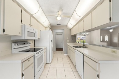 Welcome to this well maintained 2-bedroom, 2-bathroom on Oak Hills Country Club in Florida - for sale on GolfHomes.com, golf home, golf lot