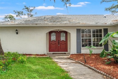 Welcome to this well maintained 2-bedroom, 2-bathroom on Oak Hills Country Club in Florida - for sale on GolfHomes.com, golf home, golf lot