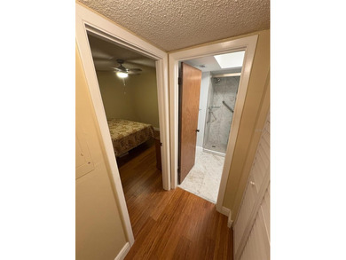 Step inside this condo and appreciate the bright, open floor on Tarpon Springs Golf Course in Florida - for sale on GolfHomes.com, golf home, golf lot